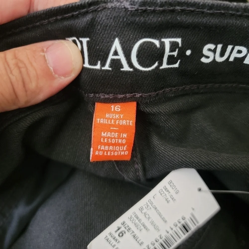 The children place Black super skinny jeans size 16 Husky.